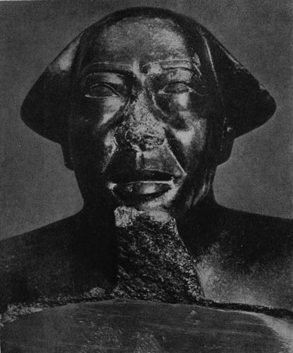 99а. Голова статуи Монтуэмхета. Гранит. XXV династия. Около 670 г. до н.э.Каир. Музей.
