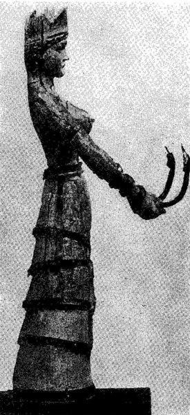 106а. Богиня со змеями. Статуэтка из слоновой кости с золотом. Середина 2 тысячелетия до н. э. Бостон. Музей изящных искусств.